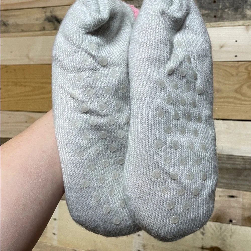 One Maurices brand boot socks and Unicorn Slippers